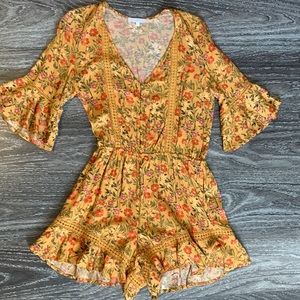 Gorgeous marigold floral romper